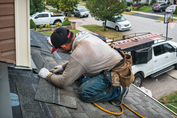 Professional Roof Replacement technician working in Estell Manor, NJ